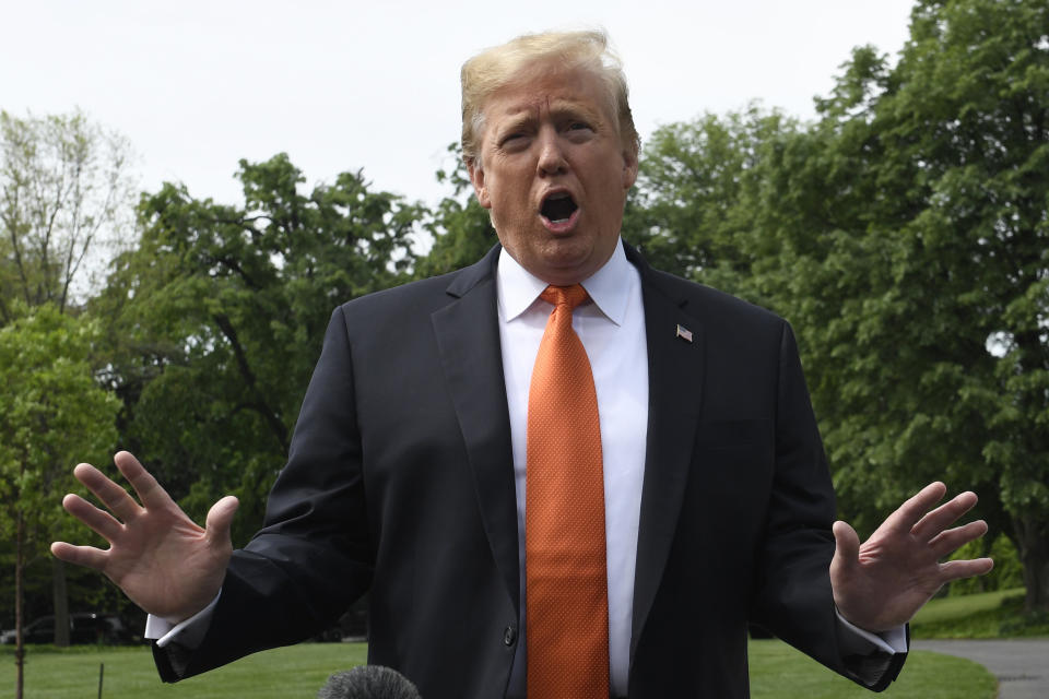 President Donald Trump talks with reporters on the South Lawn of the White House in Washington, Wednesday, April 24, 2019, before boarding Marine One for the short trip to Andrews Air Force Base in Maryland. Trump and first lady Melania Trump are heading to Atlanta to speak at a drug abuse summit. (AP Photo/Susan Walsh)