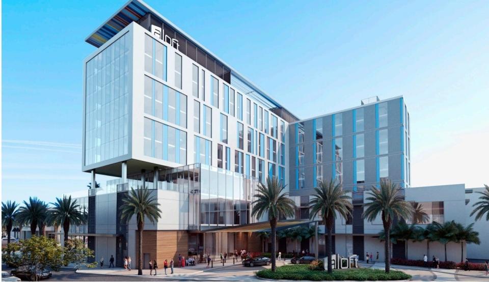 Renderings show a plan for apartments and a hotel at Downtown Palm Beach Gardens. The shopping center is pivoting to residential uses to create a multi-use downtown area.