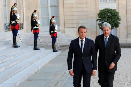 French President Emmanuel Macron meets Italian Prime Minister Paolo Gentiloni at the Elysee Palace in Paris, France May 21, 2017. REUTERS/Philippe Wojazer