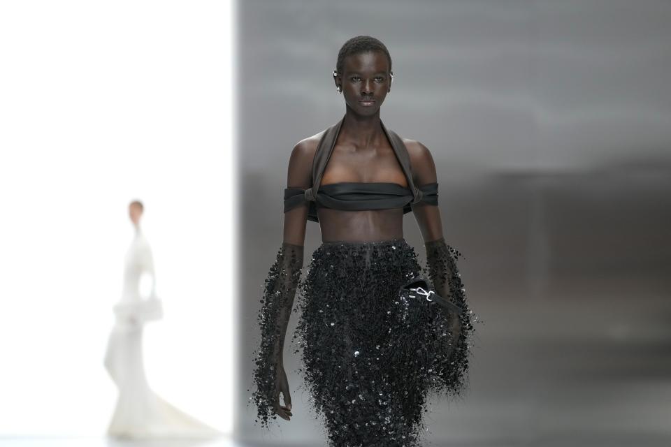 A model wears a creation for Fendi as part of the Haute Couture Spring-Summer 2024 collection presented in Paris, Thursday, Jan. 25, 2024. (AP Photo/Thibault Camus)