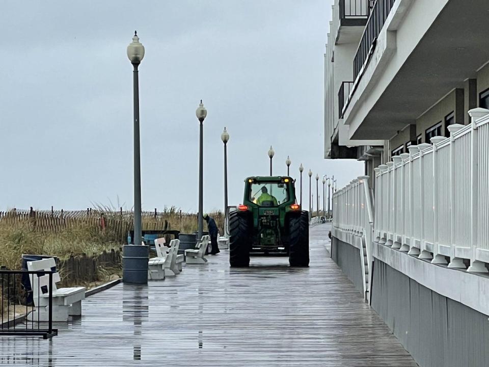 City workers cleaned up dune crossing areas in Rehoboth Beach Tuesday, Oct. 4, 2022.