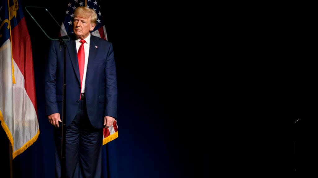 Former U.S. President Donald Trump listens to Laura Trump tell the crowd she has decided not to run for the N.C. Senate at the NCGOP state convention on June 5, 2021 in Greenville, North Carolina. (Photo by Melissa Sue Gerrits/Getty Images)