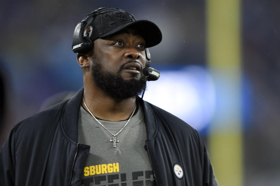 FILE - In this Dec. 29, 2019, file photo, Pittsburgh Steelers head coach Mike Tomlin looks on during the first half of an NFL football game against the Baltimore Ravens in Baltimore. More than half of the 32 NFL teams will not have their coaching staffs back at their facilities Friday. June 5, 2020, even though the league has approved such returns where local governments allow them. Clubs with coaches in place at their training complexes were Super Bowl champion Kansas City, Pittsburgh, Cincinnati, Cleveland, Houston, Denver, Dallas and Atlanta. (AP Photo/Gail Burton, File)