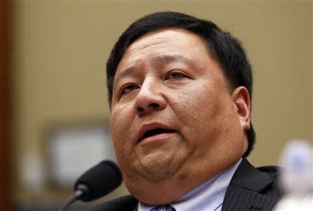 Deputy Director of the Office of Information Services Centers for Medicare and Medicaid Services Henry Chao testifies before the House Oversight and Government Reform Committee hearing on "ObamaCare" implementation on Capitol Hill in Washington, November 13, 2013. REUTERS/Larry Downing