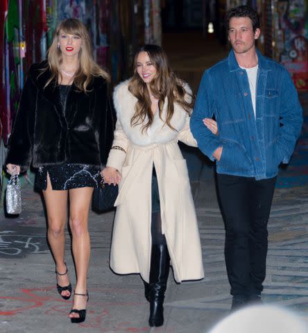 <p>Gotham/GC Images</p> Taylor Swift, Keleigh Sperry and Miles Teller in New York City on Dec. 13, 2023