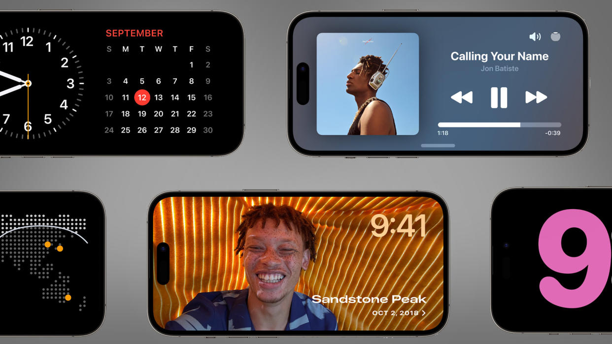  Several iPhones on a grey background showing the new StandBy mode in iOS 17. 