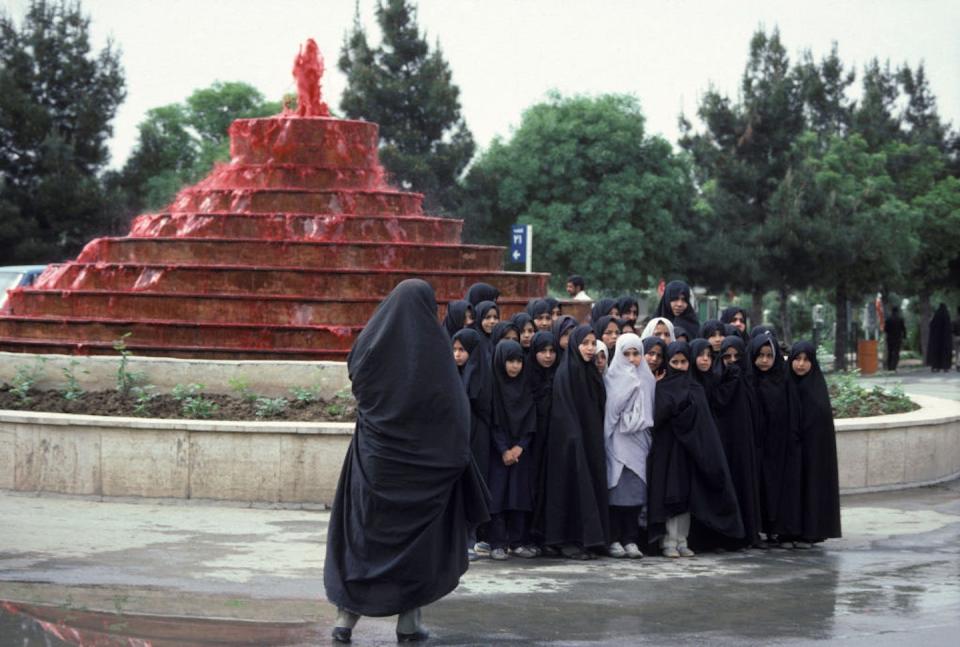 Veiled girls in Tehran in 1986. <a href="https://www.gettyimages.com/detail/news-photo/groupe-de-jeunes-filles-voil%C3%A9es-en-1986-%C3%A0-t%C3%A9h%C3%A9ran-lran-news-photo/947974826?phrase=iran%20veil&adppopup=true" rel="nofollow noopener" target="_blank" data-ylk="slk:Eslami Rad/Gamma-Rapho via Getty Images;elm:context_link;itc:0;sec:content-canvas" class="link ">Eslami Rad/Gamma-Rapho via Getty Images</a>