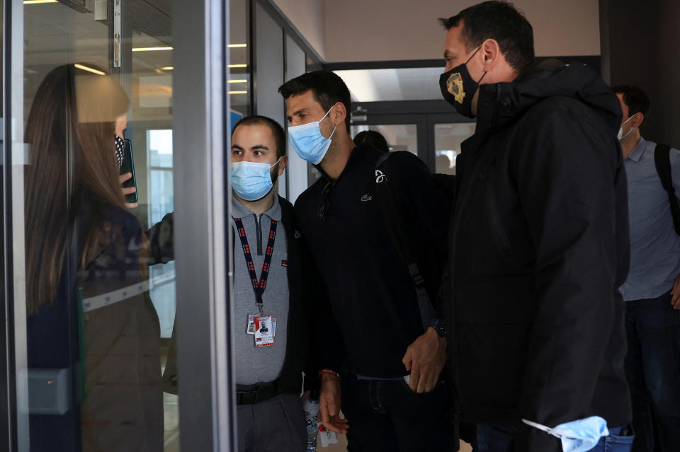 Serbian tennis player Novak Djokovic arrives at Nikola Tesla Airport, after the Australian Federal Court upheld a government decision to cancel his visa to play in the Australian Open, in Belgrade, Serbia January 17, 2022. REUTERS/Christopher Pike