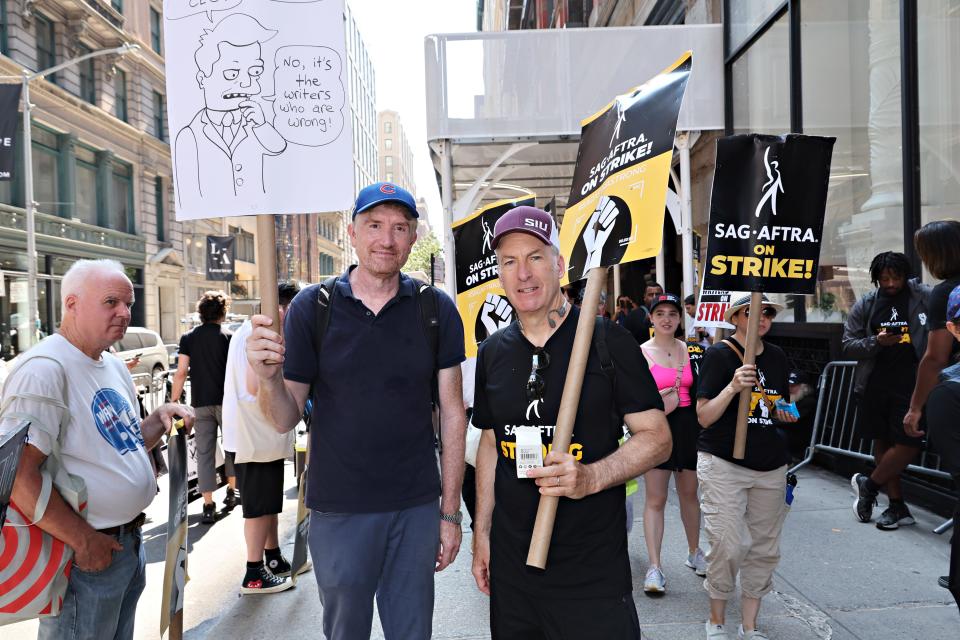 August 9, 2023: Bob Odenkirk (R joins members and supporters of the WGA and SAG-AFTRA on day 100 of the WGA strike outside Netflix and Warner Bros. in New York City. The longest-running writers' strike on record lasted 154 days in 1988.