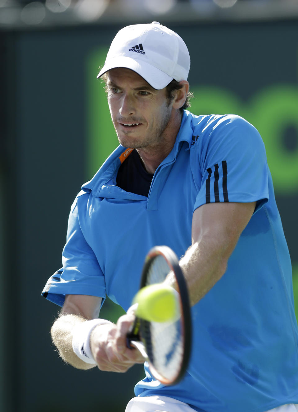 Britain's Andy Murray returns to Serbia's Novak Djokovic at the Sony Open Tennis tournament in Key Biscayne, Fla., Wednesday, March 26, 2014. (AP Photo/Alan Diaz)