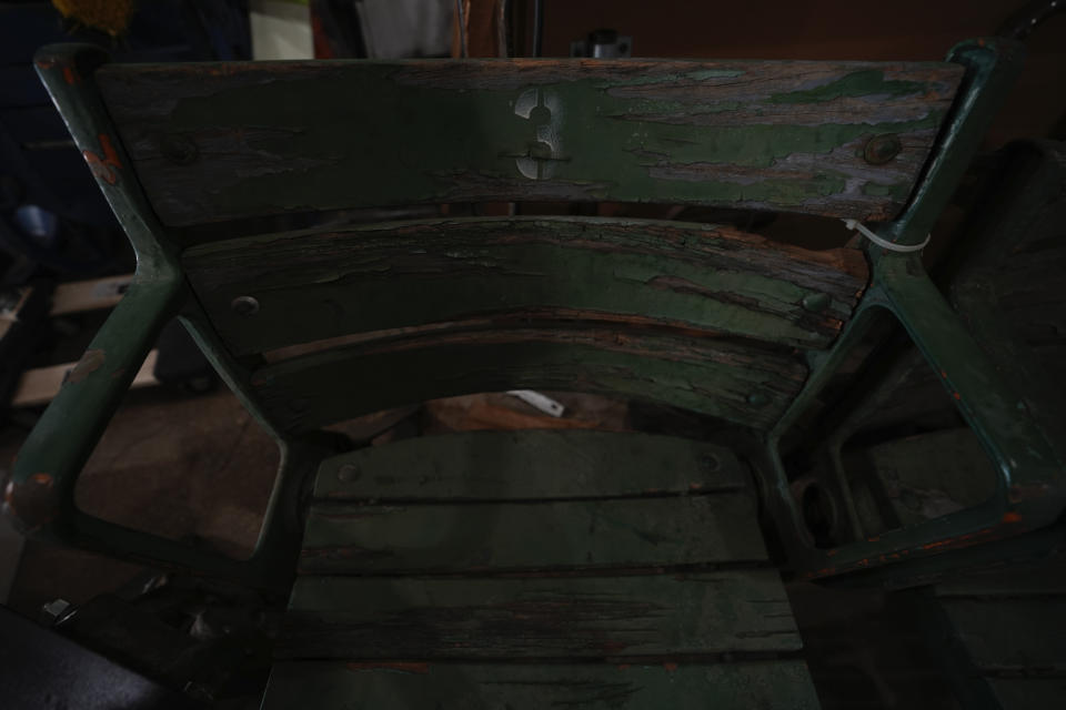 An antique chair, formally used inside Rickwood Field, was put into a storage area, Monday, June 10, 2024, in Birmingham, Ala. Rickwood Field, known as one of the oldest professional ballpark in the United States and former home of the Birmingham Black Barons of the Negro Leagues, will be the site of a special regular season game between the St. Louis Cardinals and San Francisco Giants on June 20, 2024. (AP Photo/Brynn Anderson)