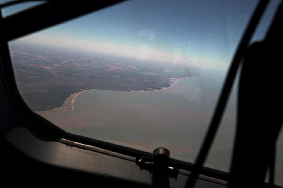 Aircraft circle above the spot where the submarine was last seen. (REUTERS)