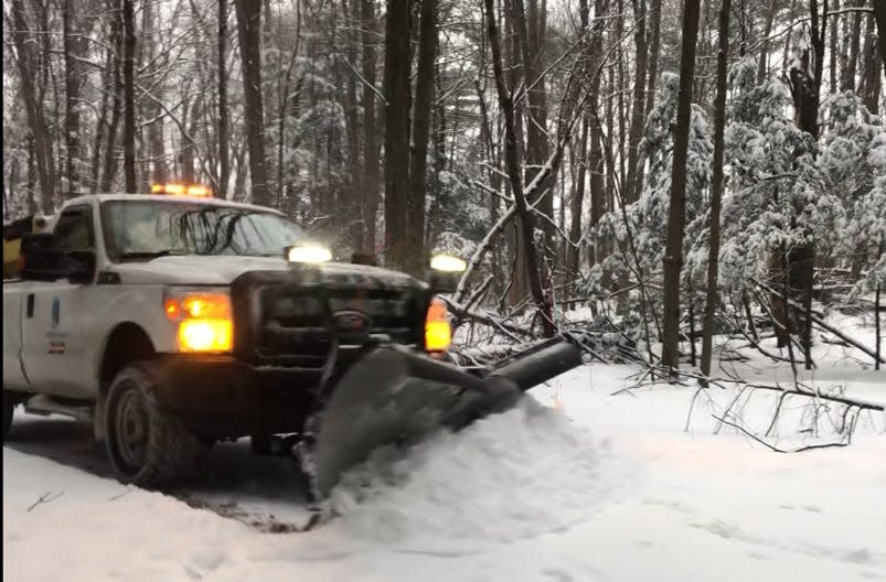 A snow plow clears the South Burlington Recreation Path during the snowstorm on Monday morning, Jan. 17, 2022.