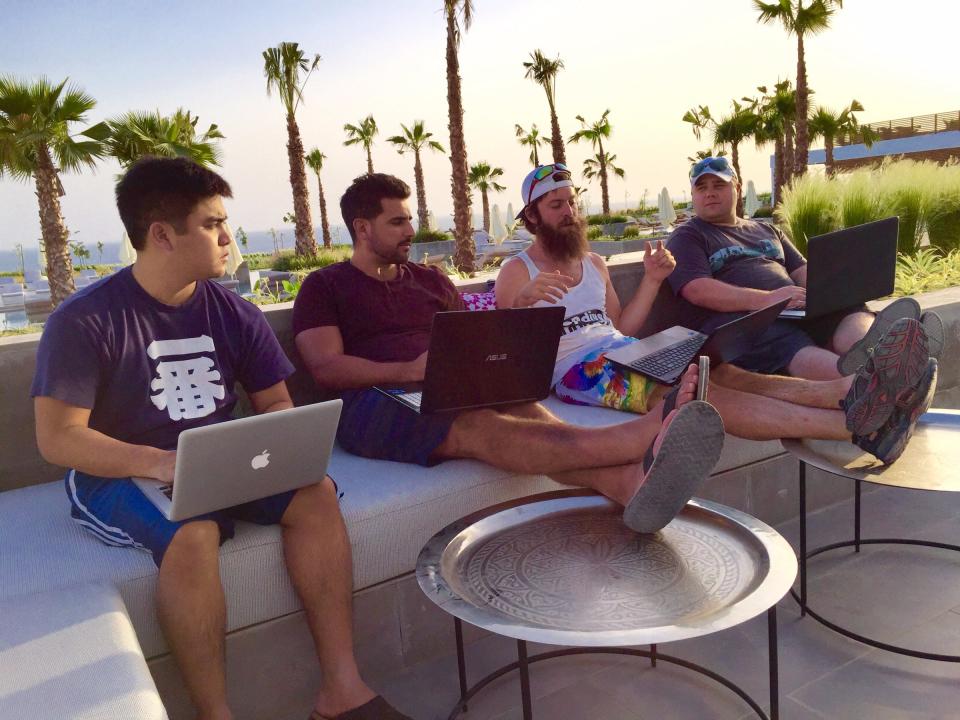 Crestani and his top lieutenants working at a team retreat in Morocco