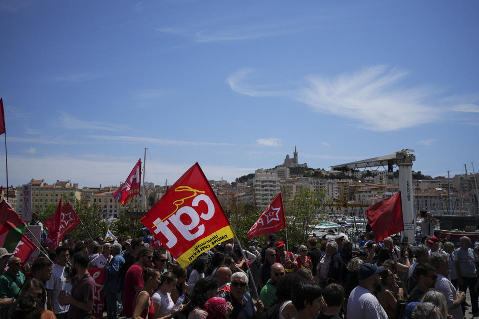 Protesters march during a demonstration in Marseille, southern France, Saturday, June 15, 2024. Anti-racism groups joined French unions and a brand-new left-wing coalition in protests in Paris and across France on Saturday against the surging nationalist far right as frenzied campaigning is underway ahead of snap parliamentary elections. (AP Photo/Daniel Cole)