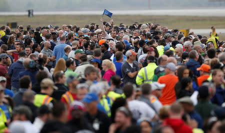 Employees and guest wait before the first flight ceremony of the new Boeing 787-10 Dreamliner at the Charleston International Airport in North Charleston, South Carolina, United States March 31, 2017. REUTERS/Randall Hill