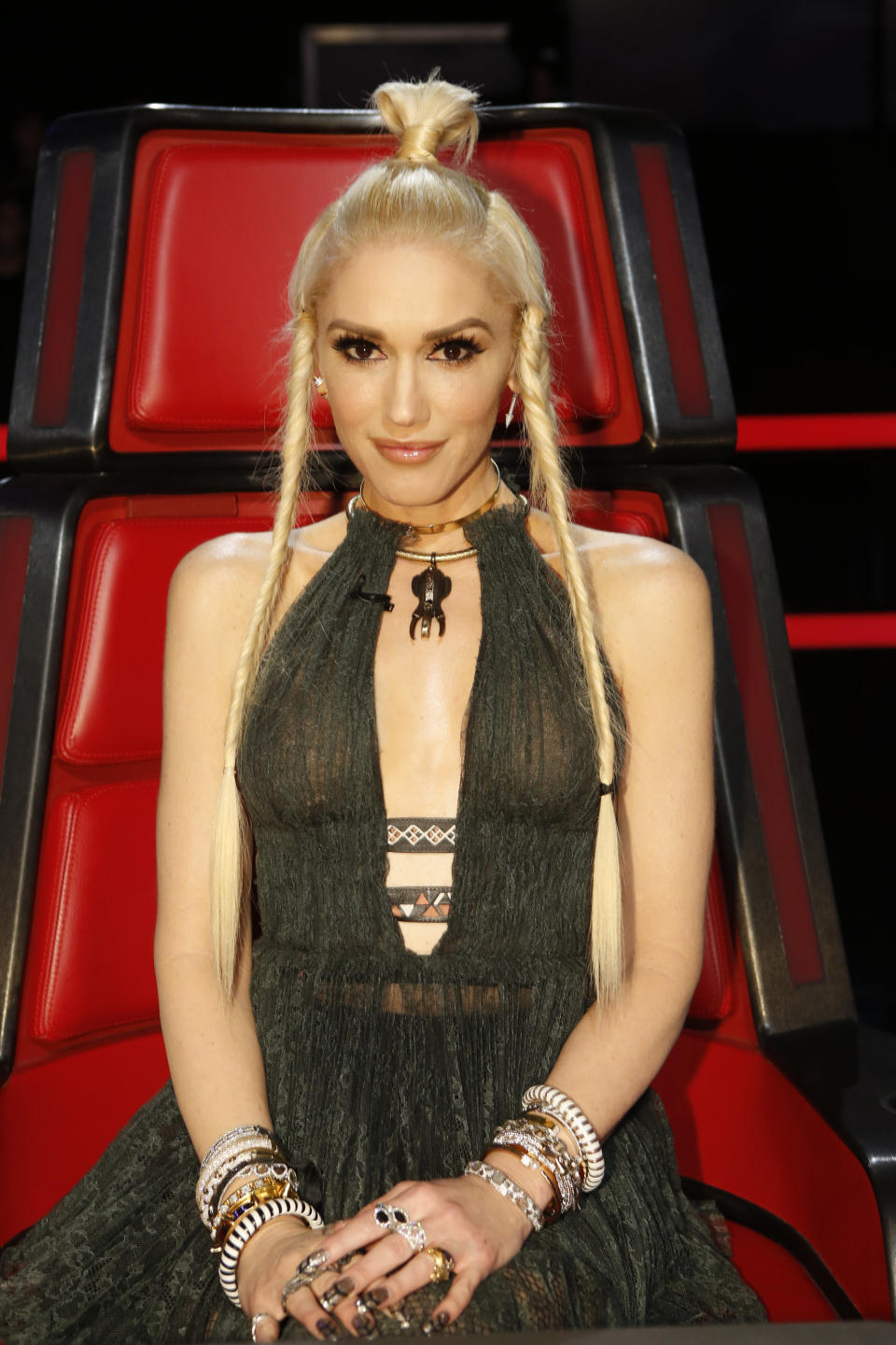 Stefani channeled "Game of Thrones" character Khaleesi on a recent episode of "The Voice" with her waist-length fishtail braids. Accentuated with her signature topknot, the slender plaits fell beautifully against her olive green gown. <a href="http://www.huffingtonpost.com/entry/3-ways-refresh-old-blowout-hairstyle_55b247b3e4b0a13f9d18308e" target="_blank">Watch this video</a><i>&nbsp;to learn how to recreate fishtail braids.</i>