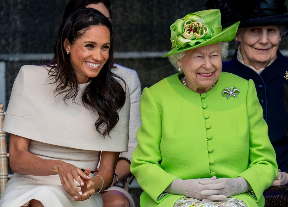 Queen Elizabeth II and Meghan, Duchess of Sussex, during a visit to the Catalyst Museum in Widnes, England, on June 14. (Photo: Mark Cuthbert via Getty Images)