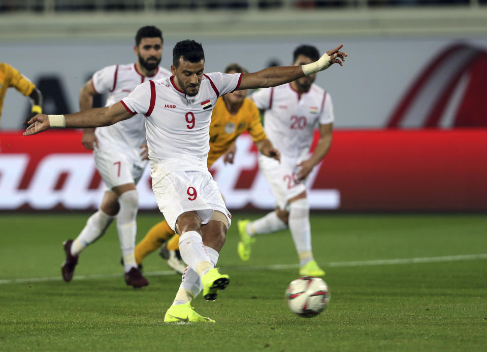 Syria's forward Omar Al Soma scores his side's second goal during the AFC Asian Cup group B soccer match between Australia and Syria at the Khalifa bin Zayed Stadium in Al Ain, United Arab Emirates, Tuesday, Jan. 15, 2019. (AP Photo/Kamran Jebreili)