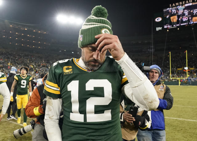 October 24, 2021: Green Bay Packers quarterback Aaron Rodgers #12 warms up  before the NFL football game between the Washington Football Team and the Green  Bay Packers at Lambeau Field in Green