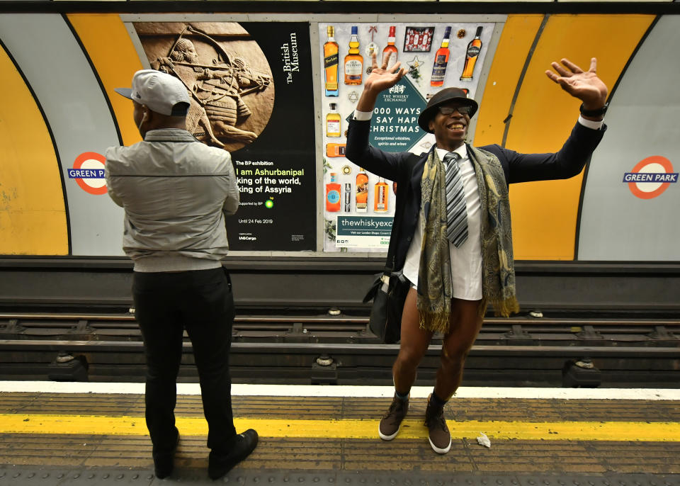 People on the Underground on the No Trousers Tube Ride in London. (Photo: Dominic Lipinski/PA Images via Getty Images)