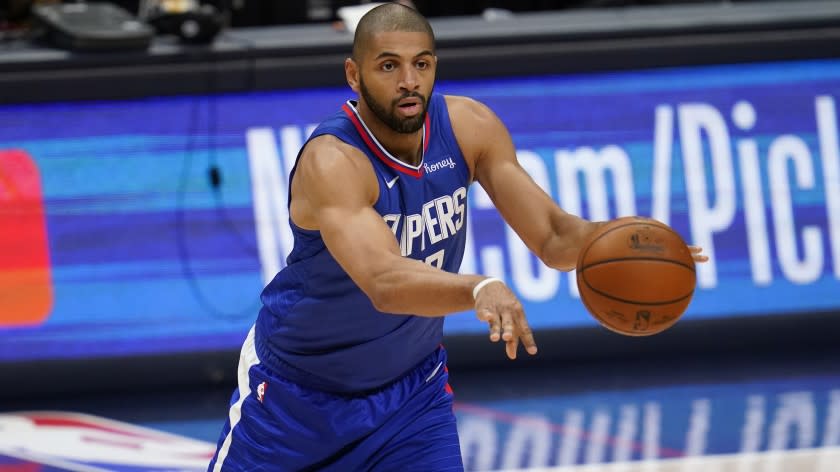 Los Angeles Clippers forward Nicolas Batum in the second half of an NBA basketball game late Friday, Dec. 25, 2020, in Denver. (AP Photo/David Zalubowski)