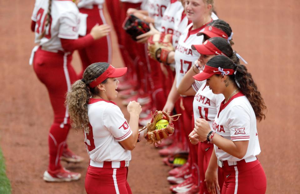 Oklahoma's Alyssa Brito (33) is introduced before the Bedlam college softball game between the University of Oklahoma Sooners and the Oklahoma State University Cowgirls at Love's Field in Norman, Okla., Sunday, May, 5, 2024.