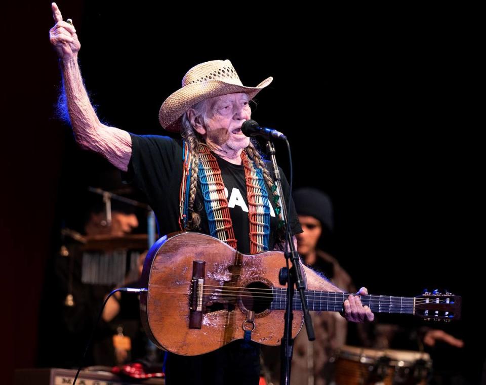 Country singer Willie Nelson, shown performing in Modesto, Calif., in 2019, spearheads the Outlaw Music Festival each year.