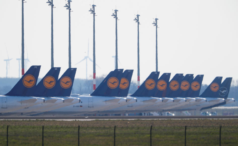 Airplanes of German carrier Lufthansa are parked at the Berlin Schoenefeld airport as the German capital is to close all bars, clubs, cinemas, theatres and concert halls with immediate effect, as Germany ramps up its efforts to slow the spread the coronavirus disease (COVID-19) in Schoenefeld, Germany, March 16, 2020.   REUTERS/Fabrizio Bensch