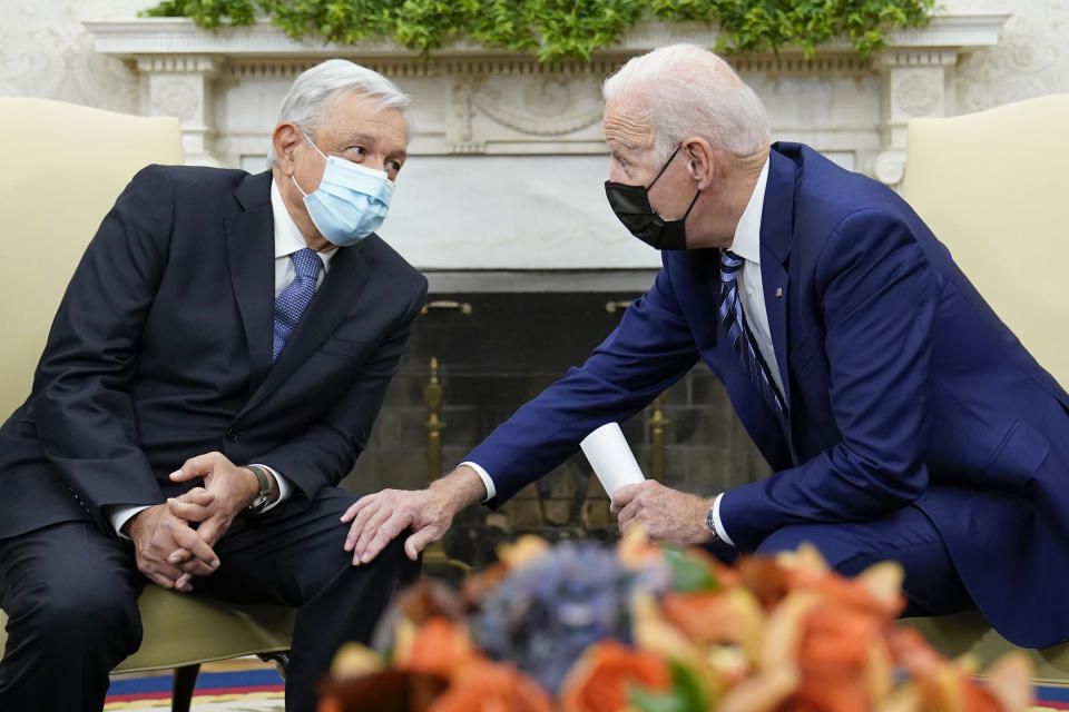 FILE - President Joe Biden meets with Mexican President Andrés Manuel López Obrador in the Oval Office of the White House in Washington, Nov. 18, 2021. President Andrés Manuel López Obrador will visit Washington Tuesday, July 12, 2022, to meet with President Joe Biden, a month after López Obrador snubbed Biden's invitation to the Summit of the Americas in Los Angeles. (AP Photo/Susan Walsh, File)