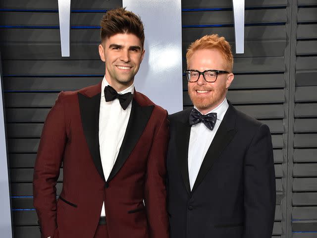 John Shearer/Getty Jesse Tyler Ferguson and his husband Justin Mikita attend the 2018 Vanity Fair Oscar Party on March 4, 2018 in Beverly Hills, California