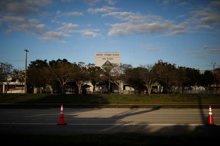 The entrance to Marjory Stoneman Douglas High School is seen after the police security perimeter was removed, following a mass shooting in Parkland, Florida, U.S., February 18, 2018. REUTERS/Carlos Garcia Rawlins