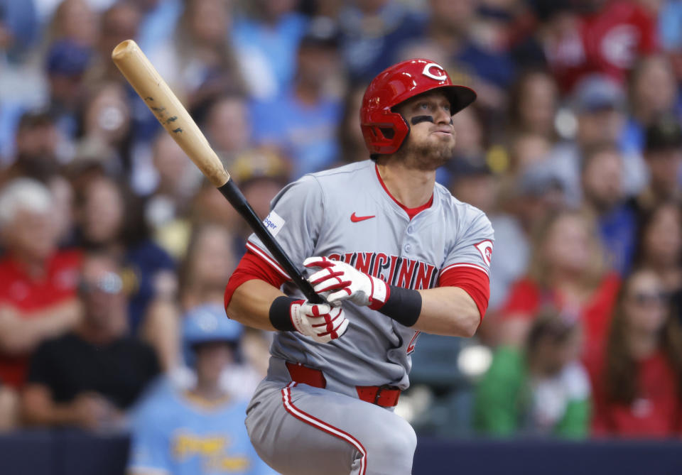 Cincinnati Reds' TJ Friedl watches his home run agains the Milwaukee Brewers during the third inning of a baseball game Friday, June 14, 2024, in Milwaukee. (AP Photo/Jeffrey Phelps)