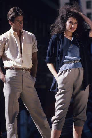 <p>Fairchild Archive/Penske Media via Getty</p> Calvin Klein with Andie MacDowell in 1981