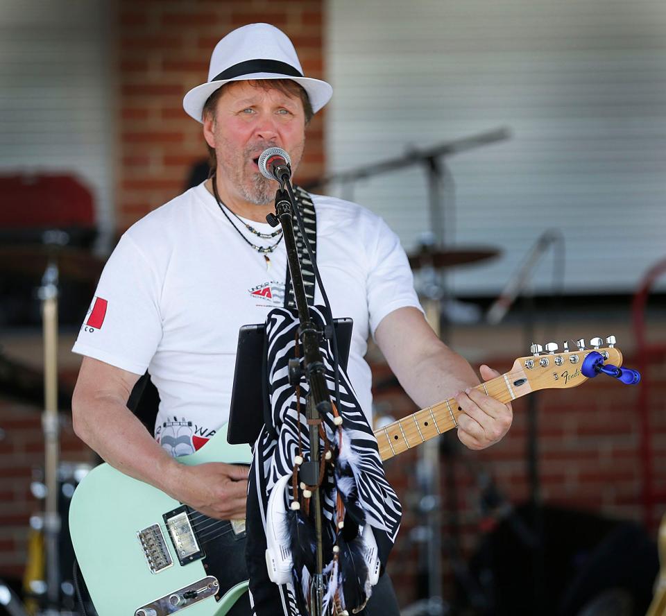 The local band "Gunpowder and Lead" play for the crowd. Lead singer Bob Anderson.A Memorial Day picnic at Forge Pond Park in Hanover drew many residents for music fun and food on Monday May 30, 2022   