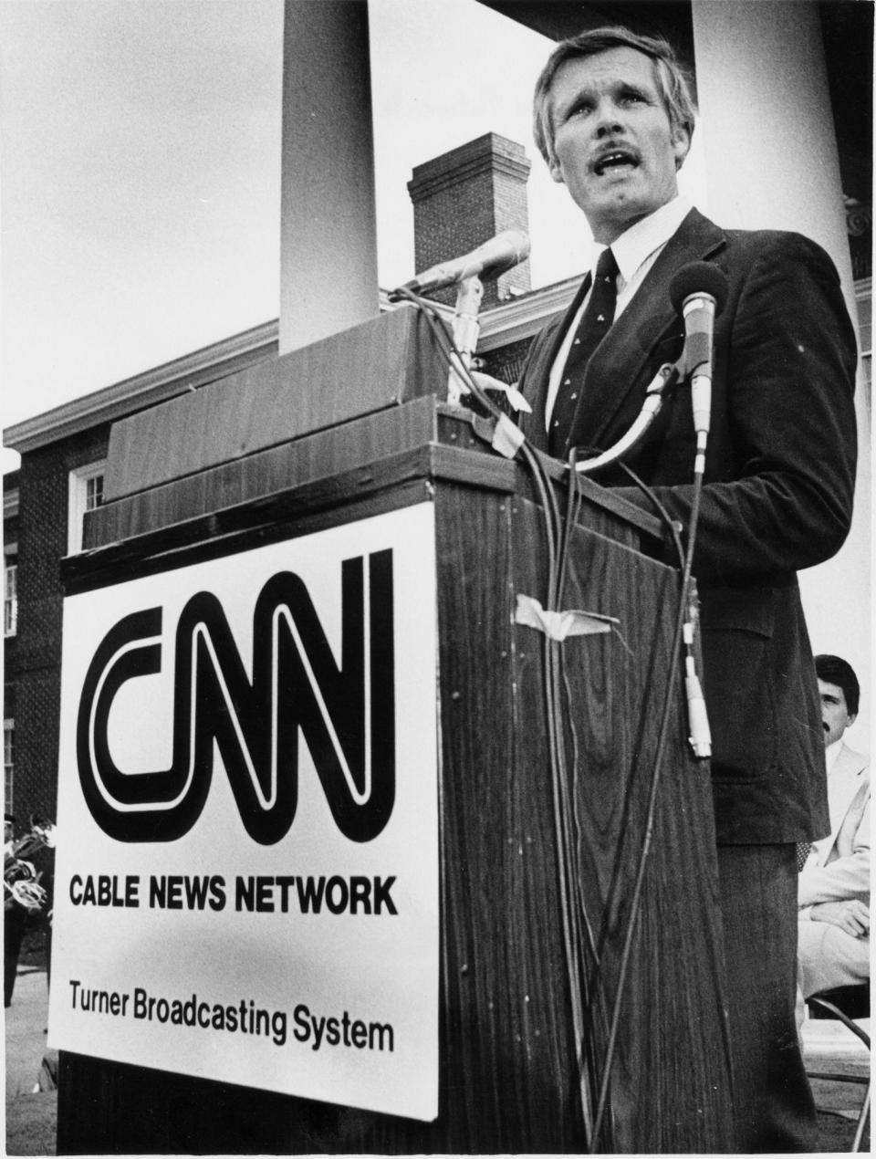 Media mogul Ted Turner speaks during opening-day ceremonies at CNN in June 1980 in Atlanta. | Joe Benton, Atlanta Journal-Constitution via AP