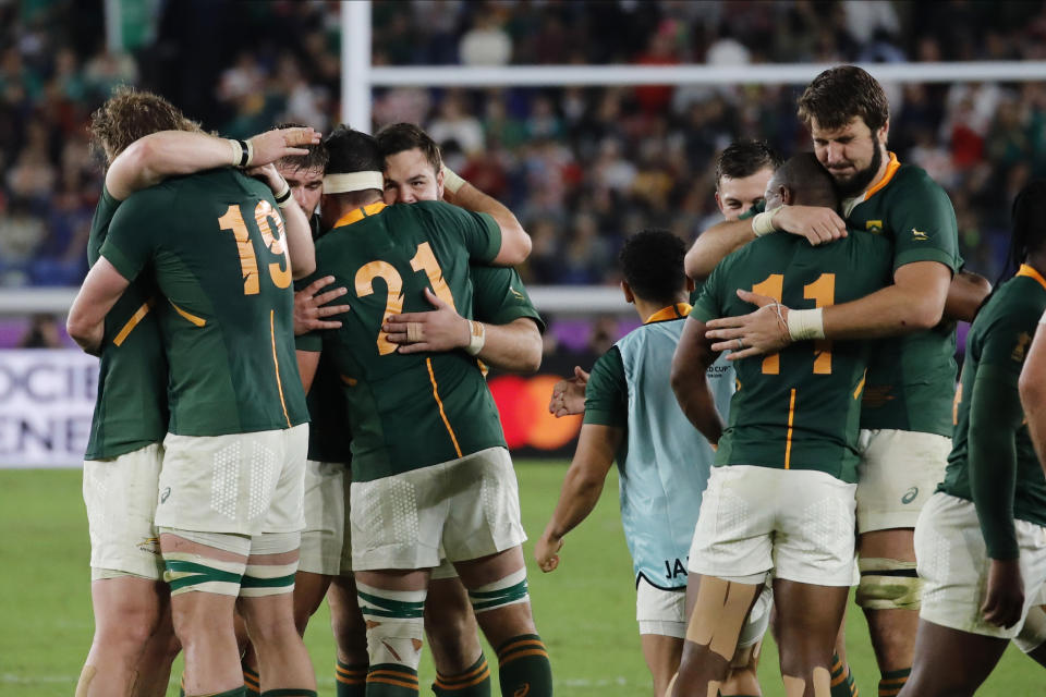 South Africa players celebrate after the Rugby World Cup semifinal at International Yokohama Stadium between Wales and South Africa in Yokohama, Japan, Sunday, Oct. 27, 2019. South Africa won 19-16. (AP Photo/Christophe Ena)