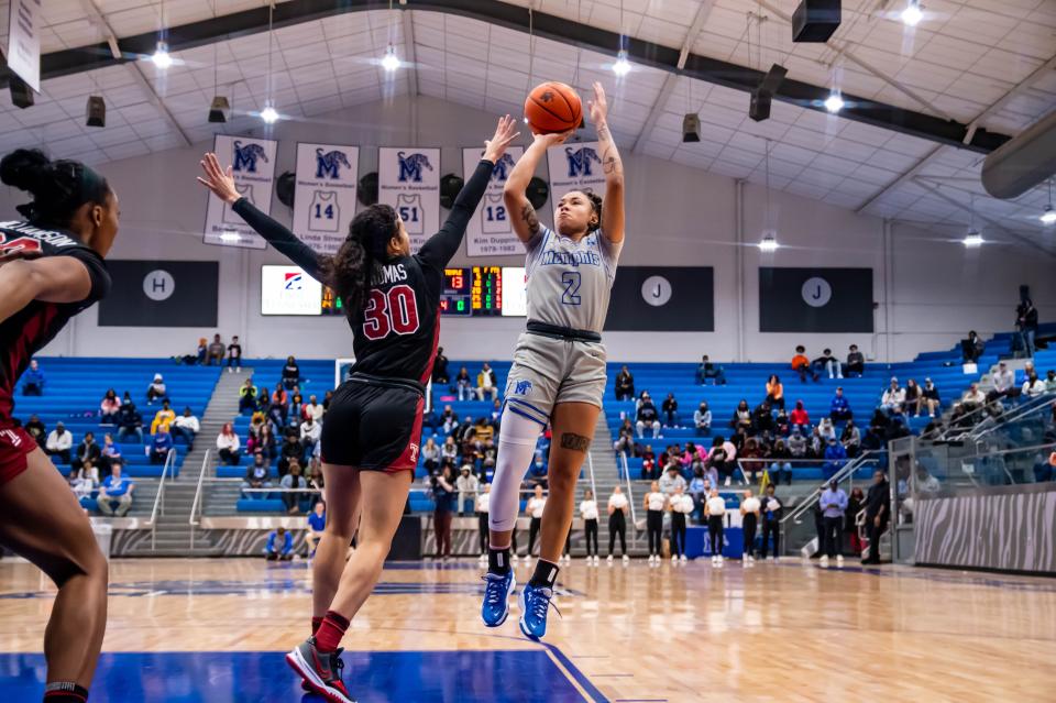 Memphis guard Madison Griggs shoots over a defender in the Tigers' win over Temple on Jan. 29, 2022.