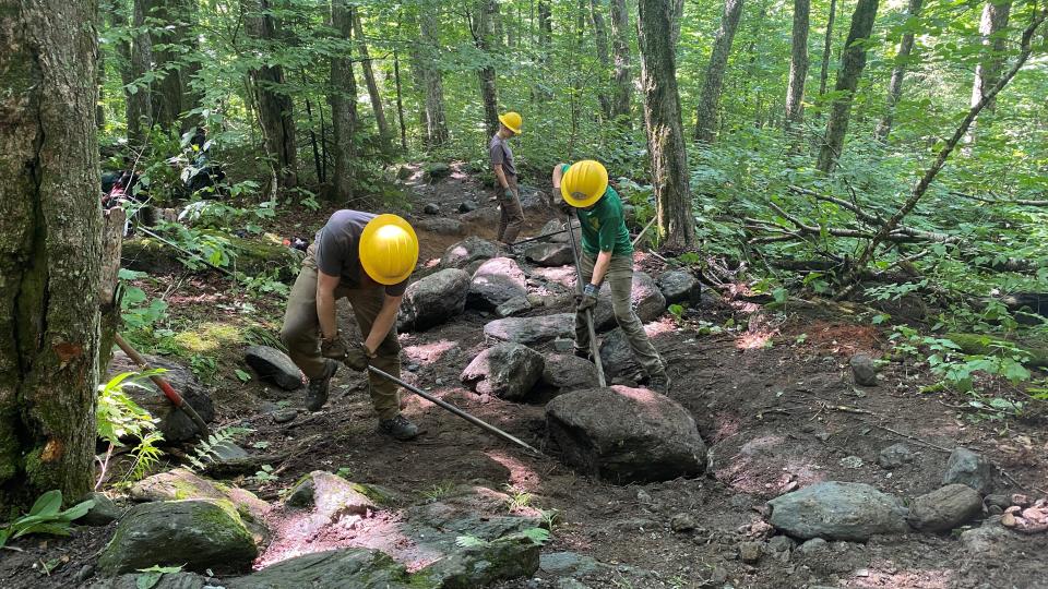 Green Mountain Club trail crew at work on the Long Trail up to Jay Peak, as seen in August 2022.