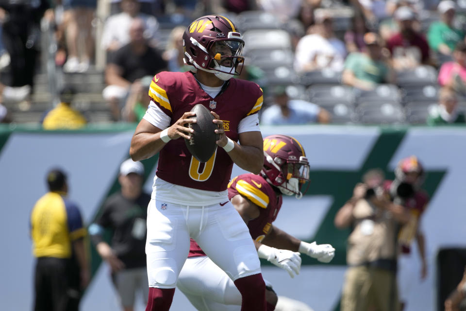 Washington Commanders quarterback Marcus Mariota drops back to pass during the first half of an NFL preseason football game against the New York Jets Saturday, Aug. 10, 2024, in East Rutherford. N.J. (AP Photo/Pamela Smith)