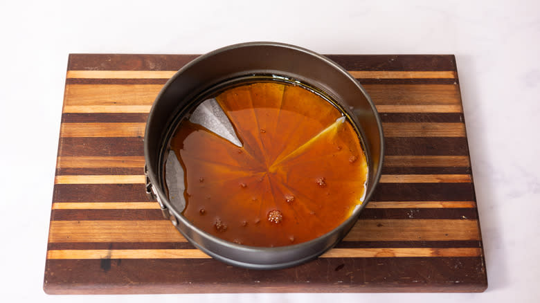 caramel sauce in lined cake pan