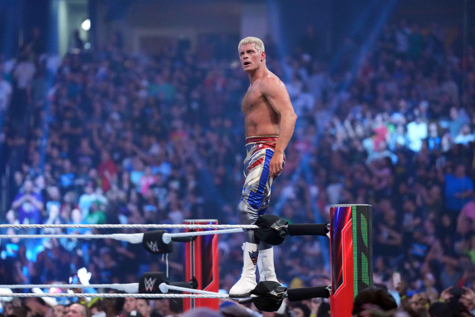 Cody Rhodes celebrates after winning the men’s Royal Rumble match.