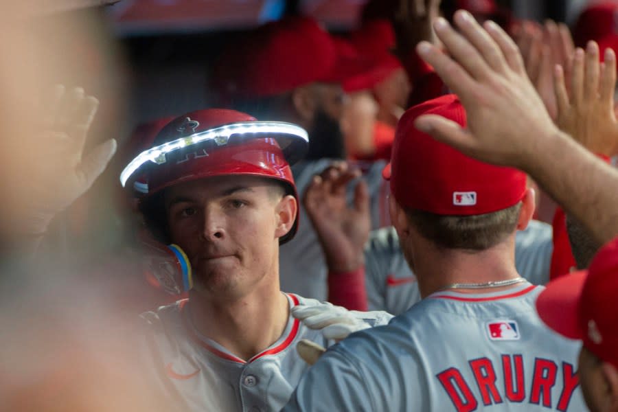 Los Angeles Angels’ Micky Moniak is greeted by his teammates after hitting a three-run home run off Cleveland Guardians starting pitcher Tanner Bibee during the fourth inning of a baseball game in Cleveland Friday, May 3, 2024. (AP Photo/Phil Long)