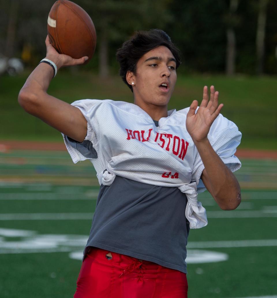 Holliston High School football senior Kaua Lima throws at practice, Oct. 11, 2023.