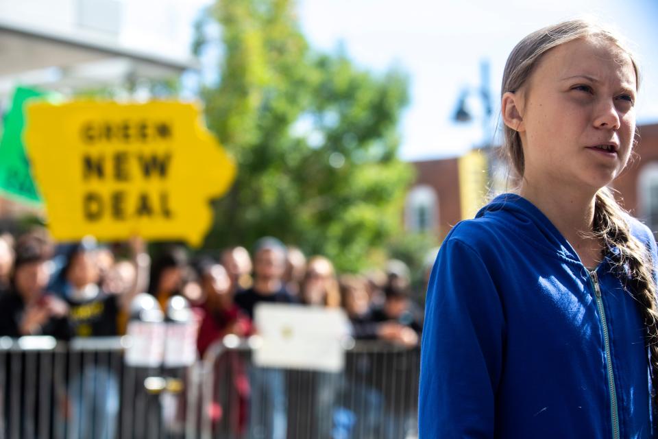 Climate activist Greta Thunberg speaks with reporters after the climate strike for a 