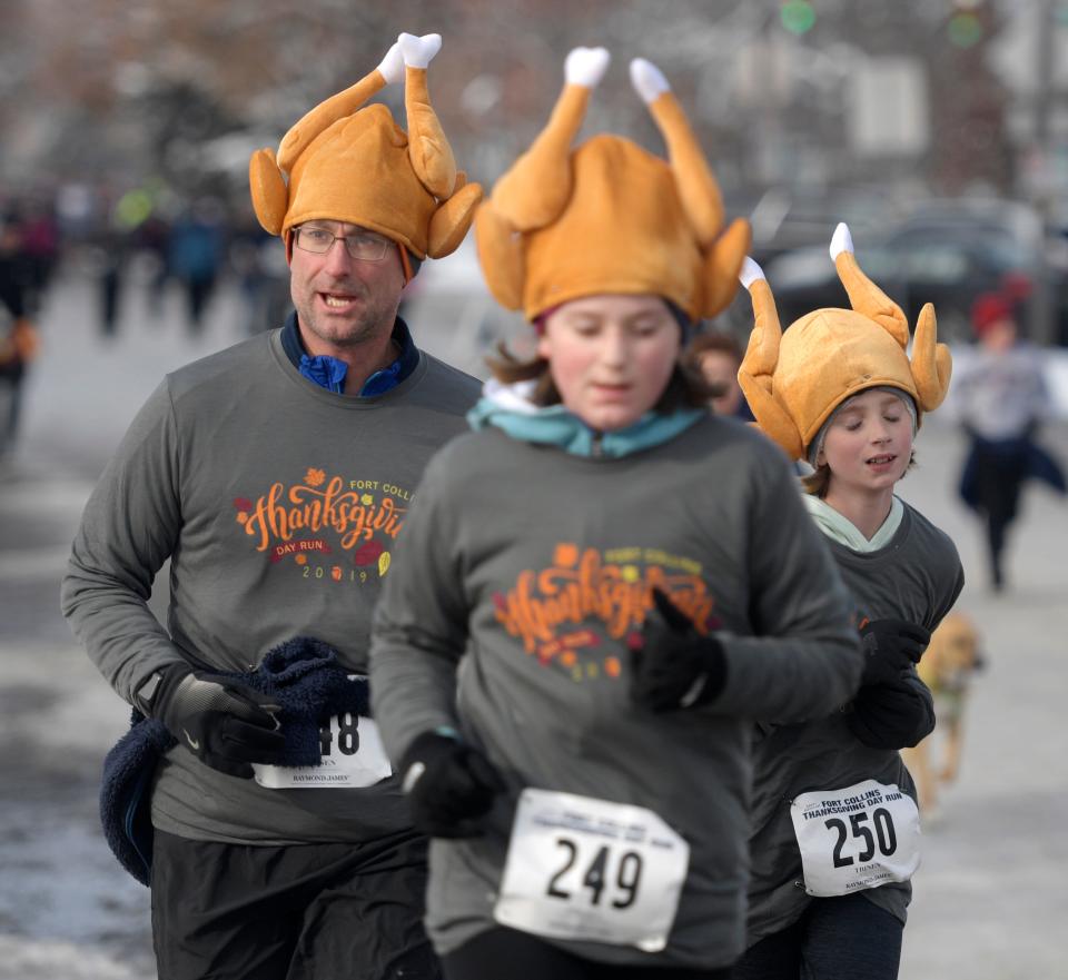 Runners compete in the 26th Annual Fort Collins Thanksgiving Day Run in Old Town Fort Collins in 2019.