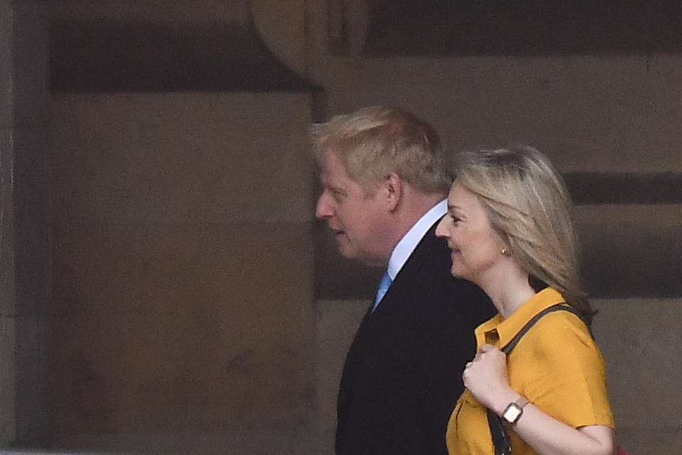 Conservative MP and leadership contender Boris Johnson (L) walks with Britain's Chief Secretary to the Treasury Liz Truss (R) at the Houses of Parliament in London on June 20, 2019. - Conservative MPs will decide on June 20 who will join Boris Johnson in the final two battling become Britain's next prime minister, with three contenders jostling for the second spot. (Photo by Ben STANSALL / AFP)        (Photo credit should read BEN STANSALL/AFP/Getty Images)