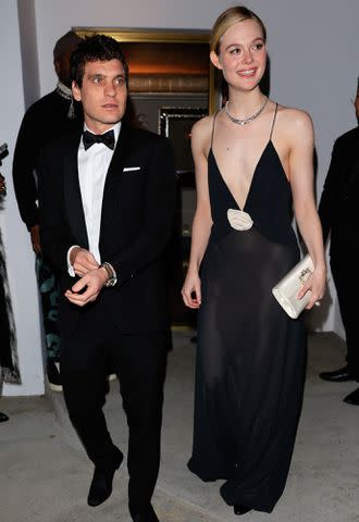 <p>Rachpoot/Bauer-Griffin/GC Images</p> Gus Wenner and Elle Fanning are seen arriving to Vas Morgan And Michael Brown's 2024 Golden Globe Awards Party on January 07, 2024.
