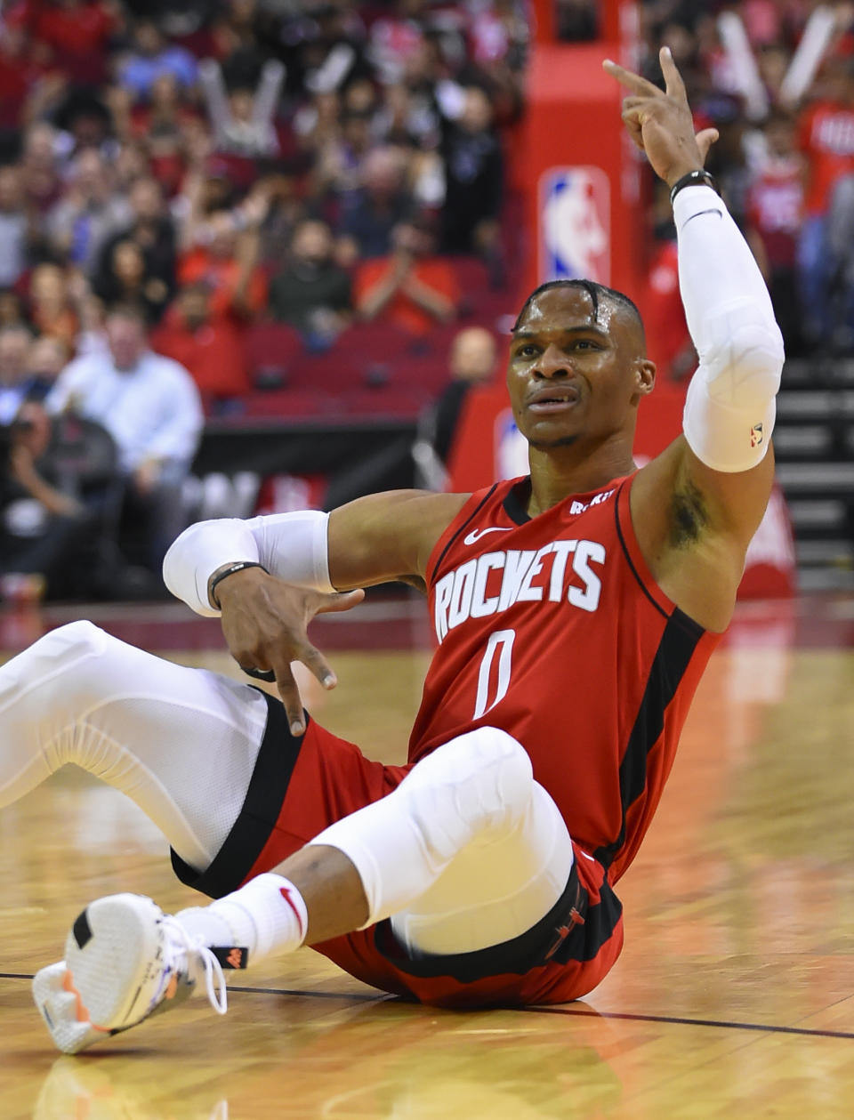 Houston Rockets guard Russell Westbrook reacts after making a 3-point basket during the first half of the team's NBA basketball game against the Milwaukee Bucks, Thursday, Oct. 24, 2019, in Houston. (AP Photo/Eric Christian Smith)