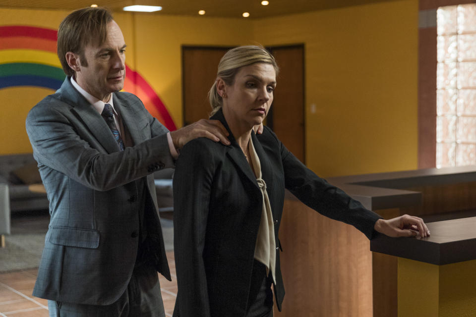 Bob Odenkirk as Jimmy McGill, Rhea Seehorn as Kim Wexler; group†- Better Call Saul _ Season 3, Episode 1 - Photo Credit: Michele K. Short/AMC/Sony Pictures Television